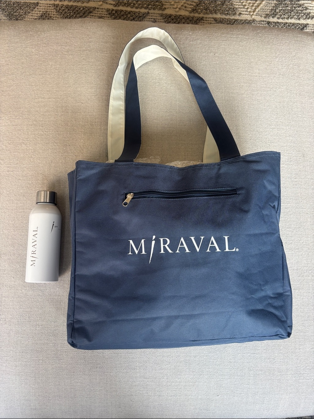 Miraval Navy Canvas Beach Tote and water bottle